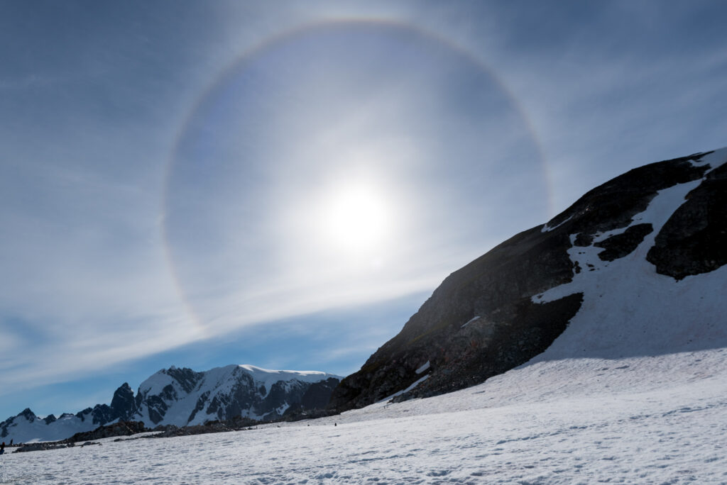 a Sun Dog over mountains in Antarctica